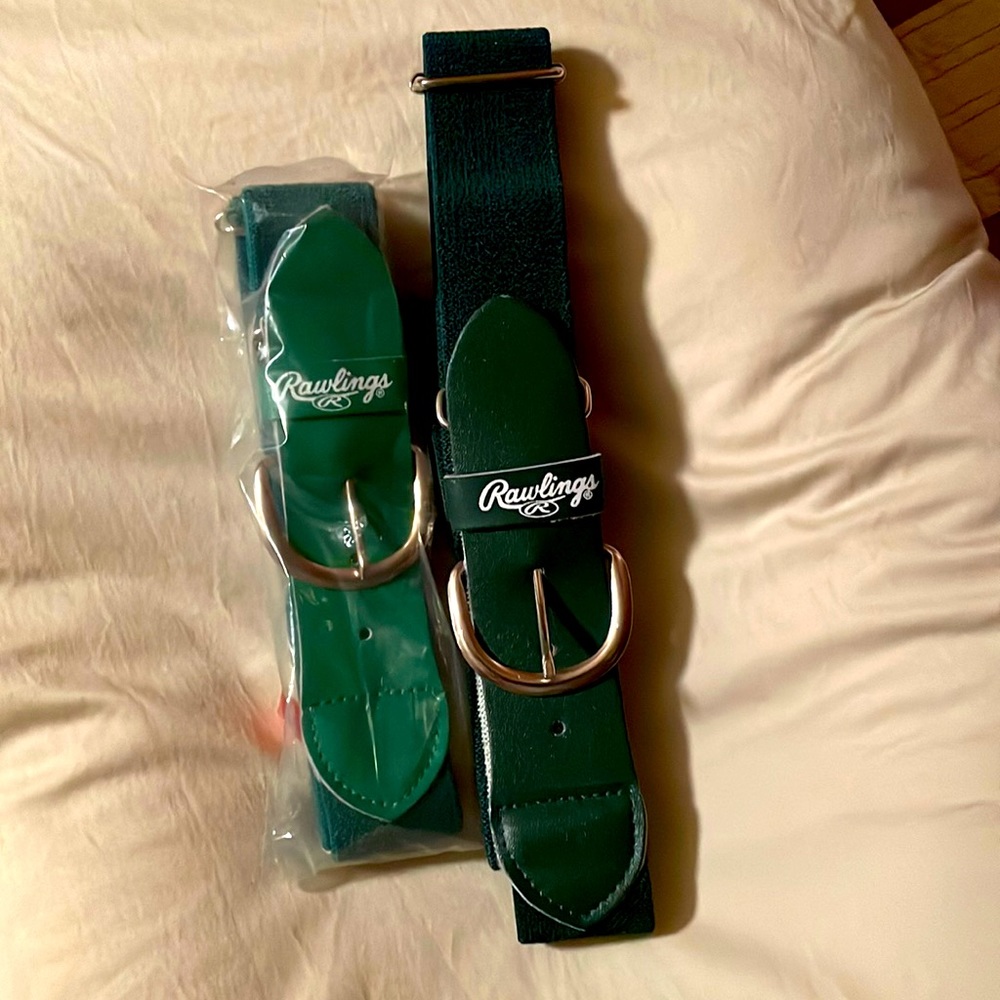 2  belts.  Rawlings adjustable belts. New